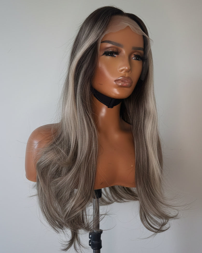 Mannequin head with long gray hair on a white background
