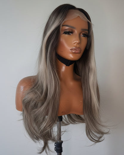 Mannequin head with long gray hair on a white background
