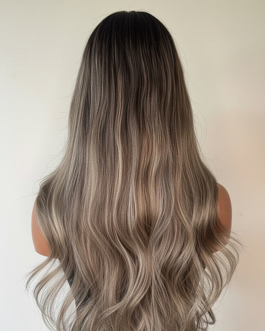 The Kaia Brunette Wave - Long, wavy hair wig with gradient color on a neutral background