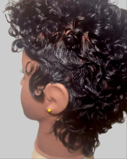 Mannequin head with a wig on a plain background - The Hair Source